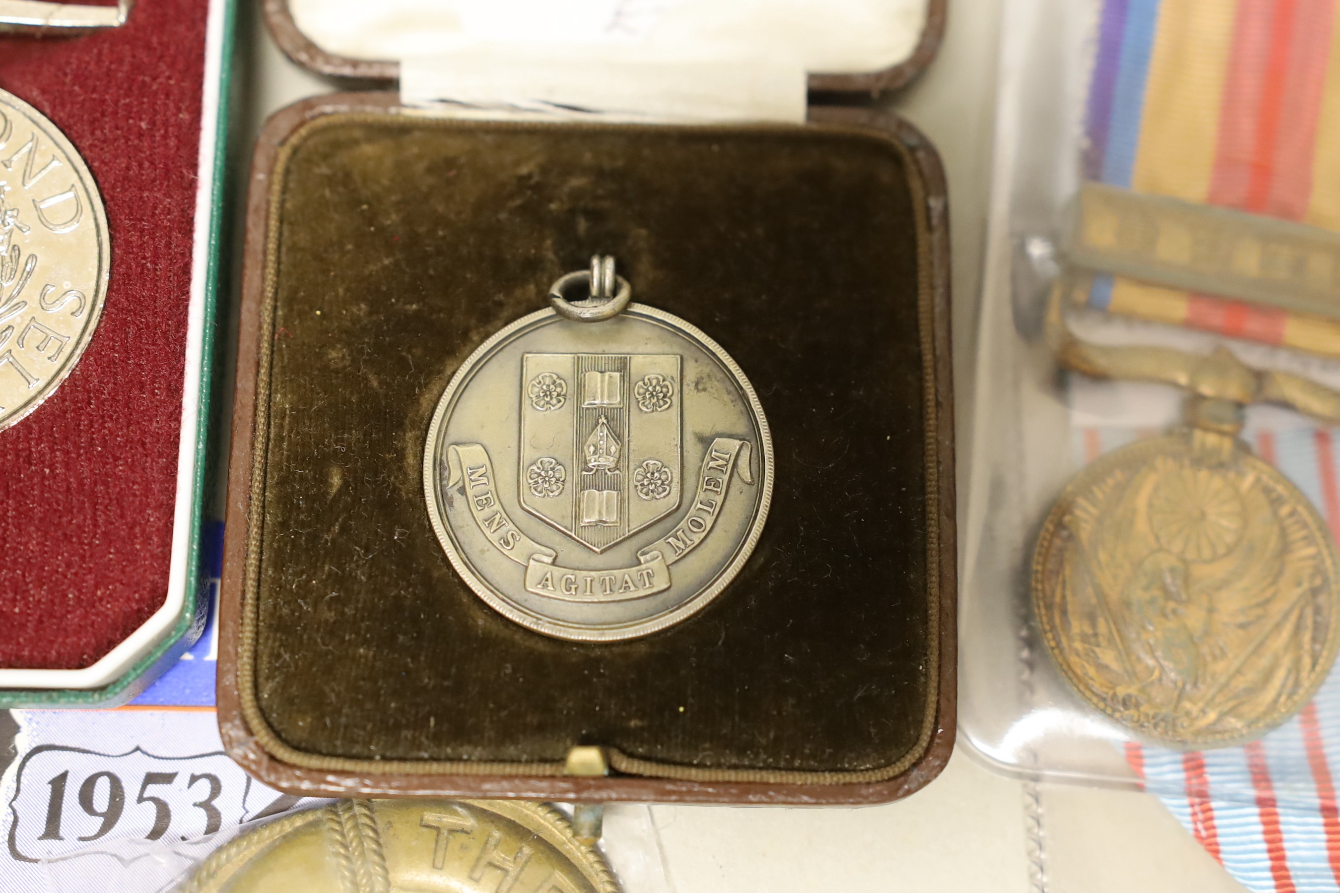 A WWI French Croix du Combattant medal, WWII Japanese China incident medal, other medals, badges, etc.